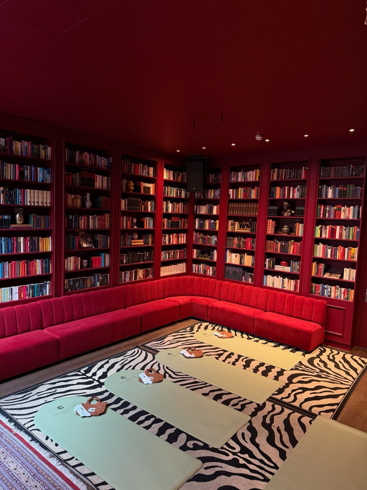 Mats laid out in the library of a private club